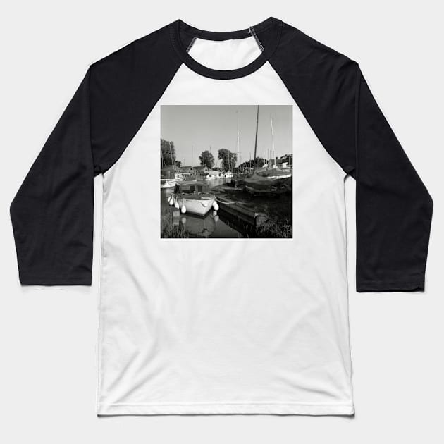 Boats moored at a harbour near Hickling Broad, Norfolk, UK Baseball T-Shirt by richflintphoto